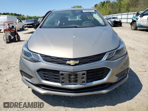 ✅ 2017 Chevrolet Cruze LT • VIN: 3G1BE6SM6HS572751 • Lot: 47690933. Listed on Copart with 65,685 mi. Free auction sales archive from the USA and detailed vehicle history report at DreamBid. Image 5.