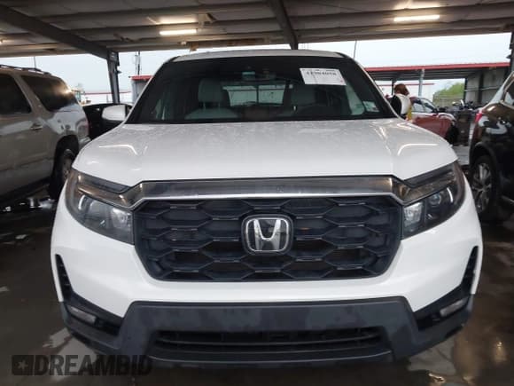✅ 2023 Honda Passport EX-L • VIN: 5FNYF8H5XPB023040 • Lot: 41904058. Listed on IAAI with 69,834 mi. Free auction sales archive from the USA and detailed vehicle history report at DreamBid. Image 12.