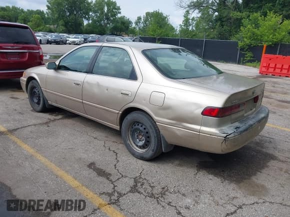✅ 1998 Toyota Camry LE • VIN: JT2BF28K0W0101016 • Lot: 42541486. Listed on IAAI with 372,974 mi. Free auction sales archive from the USA and detailed vehicle history report at DreamBid. Image 3.