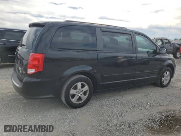 2012 Dodge Grand Caravan SXT z VIN 2C4RDGCG9CR198584, wystawiony jako Copart lot #87287765 z przebiegiem 189 694 mil mil oraz Szkoda całkowita • Salvage title. Historia ofert i sprzedaży dostępna na DreamBid. Obrazek 3.