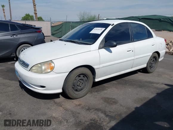✅ 2002 Kia Rio • VIN: KNADC123226182772 • Lot: 42924126. Listed on IAAI with 181,282 mi. Free auction sales archive from the USA and detailed vehicle history report at DreamBid. Image 6.