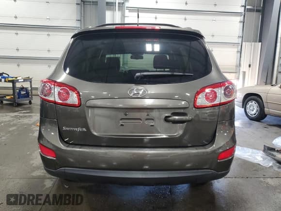 ✅ 2012 Hyundai Santa Fe SE • VIN: 5XYZH4AG4CG157273 • Lot: 72209534. Listed on Copart with 114,915 mi. Free auction sales archive from the USA and detailed vehicle history report at DreamBid. Image 6.