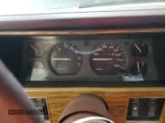 ✅ 1988 Jeep Grand Wagoneer • VIN: 1JCMT7542JT150879 • Лот: 66490815. Опубликован ранее на Copart с пробегом 147 737 миль. Бесплатный доступ к архиву аукционных продаж из США и подробный отчёт об истории автомобиля на DreamBid. Изображение 9.