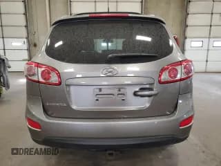 ✅ 2012 Hyundai Santa Fe SE • VIN: 5XYZH4AG2CG108198 • Lot: 76877024. Listed on Copart with 190,609 mi. Free auction sales archive from the USA and detailed vehicle history report at DreamBid. Image 6.