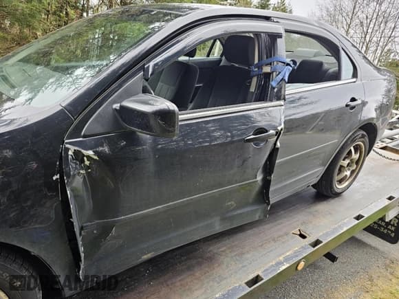 ✅ 2006 Mercury Milan • VIN: 3MEFM07Z06R629378 • Lot: 42087954. Listed on IAAI with 84,404 mi. Free auction sales archive from the USA and detailed vehicle history report at DreamBid. Image 6.