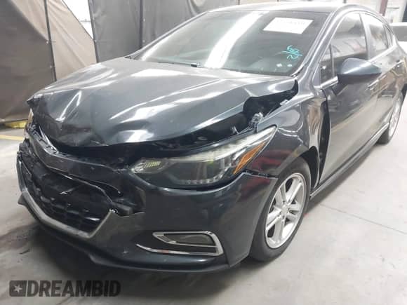 2018 Chevrolet Cruze LT with VIN 3G1BD6SMXJS542564, listed as a IAAI auction lot 41558459 with 103,720 mi miles and . Bid and sale history available at DreamBid. Image 6.