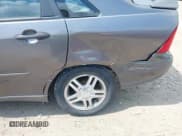 ✅ 2004 Ford Focus SE • VIN: 1FAFP34334W177338 • Lot: 42003202. Listed on IAAI with 190,581 mi. Free auction sales archive from the USA and detailed vehicle history report at DreamBid. Image 6.