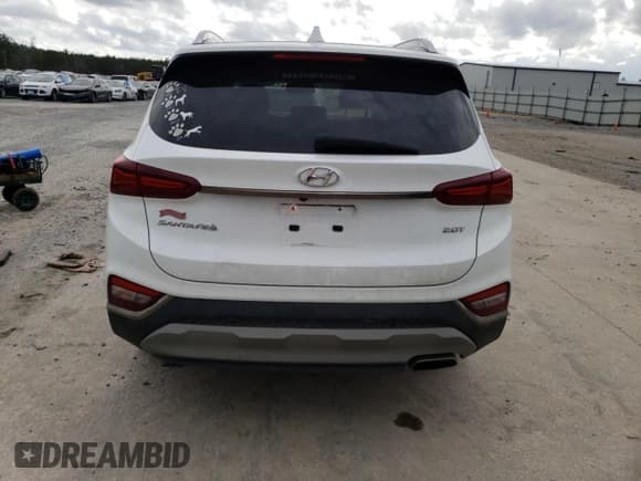 ✅ 2020 Hyundai Santa Fe Limited • VIN: 5NMS53AA0LH173959 • Лот: 39062383. Опубликован ранее на Copart с пробегом 66 564 миль. Бесплатный доступ к архиву аукционных продаж из США и подробный отчёт об истории автомобиля на DreamBid. Изображение 6.