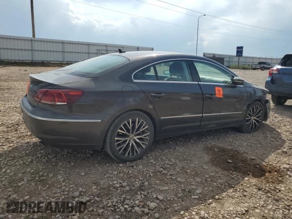 ✅ 2014 Volkswagen CC Executive • VIN: WVWGU7AN9EE523145 • Lot: 71419134. Wystawiony na Copart z przebiegiem 94 547 mil. Bezpłatny archiwum sprzedaży aukcyjnych z USA i szczegółowy raport historii pojazdu na DreamBid. Zdjęcie 3.