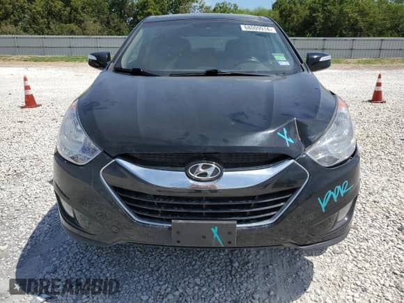 2012 Hyundai Tucson GLS z VIN KM8JU3AC5CU343138, wystawiony jako Copart lot #68009914 z przebiegiem 65 276 mil mil oraz Szkoda całkowita • Salvage title. Historia ofert i sprzedaży dostępna na DreamBid. Obrazek 5.