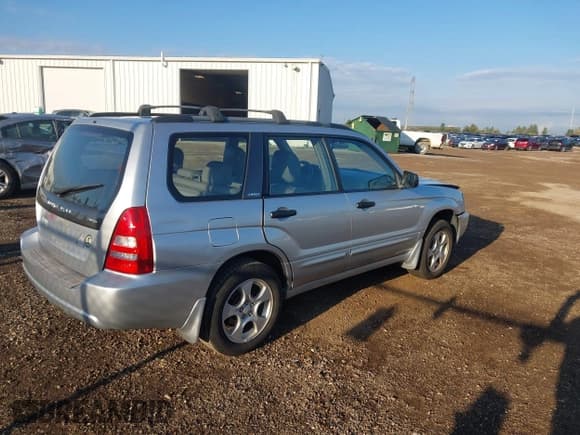 ✅ 2004 Subaru Forester XS • VIN: JF1SG65674H749217 • Lot: 43472884. Listed on IAAI with 105,644 mi. Free auction sales archive from the USA and detailed vehicle history report at DreamBid. Image 4.