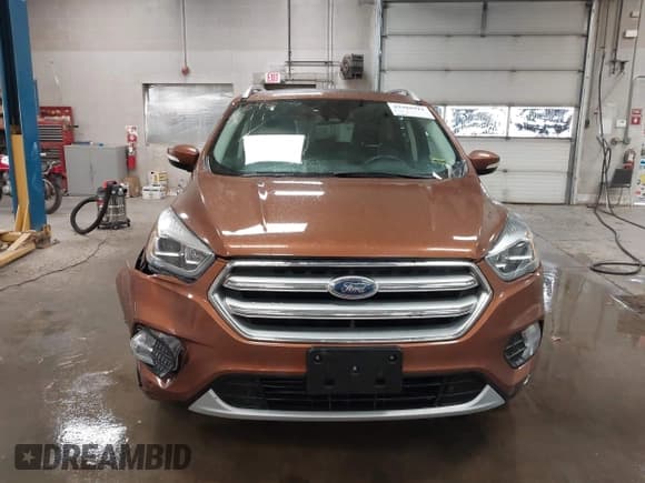 ✅ 2017 Ford Escape Titanium • VIN: 1FMCU9J95HUA33532 • Lot: 43488911. Listed on IAAI with 83,970 mi. Free auction sales archive from the USA and detailed vehicle history report at DreamBid. Image 12.
