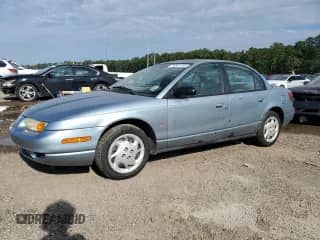 2002 Saturn SL с VIN 1G8ZK52762Z124159, выставлен на аукционе Copart как лот 70361145 с пробегом Не указан миль и Чистый • Clean title. История ставок и продаж доступна на DreamBid. Изображение 1.