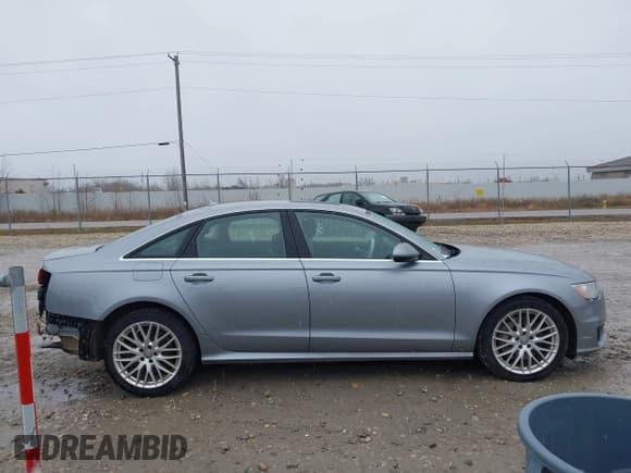 ✅ 2016 Audi A6 Premium Plus • VIN: WAUGFAFC7GN056094 • Лот: 43650125. Опубликован ранее на IAAI с пробегом 125 093 миль. Бесплатный доступ к архиву аукционных продаж из США и подробный отчёт об истории автомобиля на DreamBid. Изображение 13.
