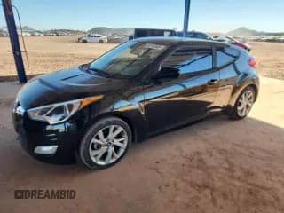 2017 Hyundai Veloster z VIN KMHTC6AD0HU308455, wystawiony jako Copart lot #82752635 z przebiegiem 179 403 mil mil oraz Czysty tytuł • Clean title. Historia ofert i sprzedaży dostępna na DreamBid. Obrazek 1.