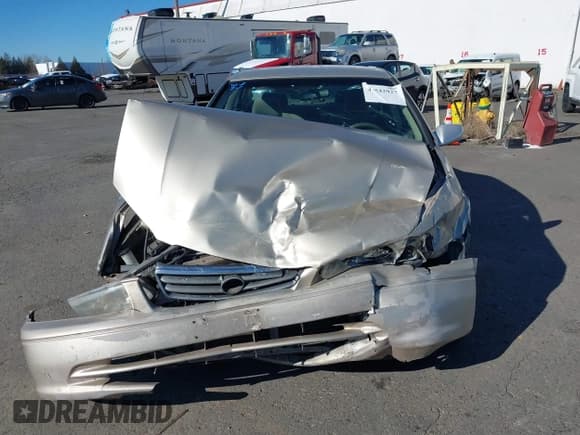 ✅ 2000 Toyota Camry LE • VIN: JT2BG22K6Y0383168 • Лот: 41542927. Опубликован ранее на IAAI с пробегом 206 712 миль. Бесплатный доступ к архиву аукционных продаж из США и подробный отчёт об истории автомобиля на DreamBid. Изображение 11.