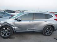 ✅ 2017 Honda CR-V Touring • VIN: 2HKRW1H97HH505613 • Лот: 43160456. Опубликован ранее на IAAI с пробегом 120 040 миль. Бесплатный доступ к архиву аукционных продаж из США и подробный отчёт об истории автомобиля на DreamBid. Изображение 14.