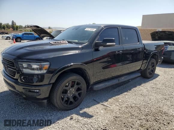 ✅ 2021 Ram 1500 Laramie • VIN: 1C6SRFJM5MN598833 • Lot: 61274845. Wystawiony na Copart z przebiegiem 105 722 mil. Bezpłatny archiwum sprzedaży aukcyjnych z USA i szczegółowy raport historii pojazdu na DreamBid. Zdjęcie 1.