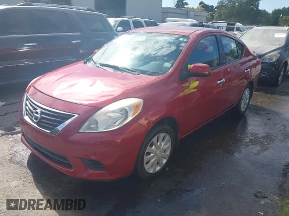 ✅ 2014 Nissan Versa SV • VIN: 3N1CN7AP2EK454806 • Lot: 43133302. Listed on IAAI with 124,222 mi. Free auction sales archive from the USA and detailed vehicle history report at DreamBid. Image 2.