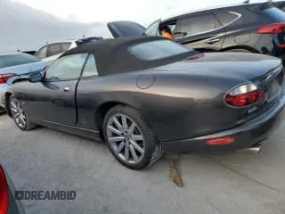✅ 2006 Jaguar XK XK8 • VIN: SAJDA42C762A48285 • Лот: 75981154. Опубликован ранее на Copart с пробегом Не указан. Бесплатный доступ к архиву аукционных продаж из США и подробный отчёт об истории автомобиля на DreamBid. Изображение 2.