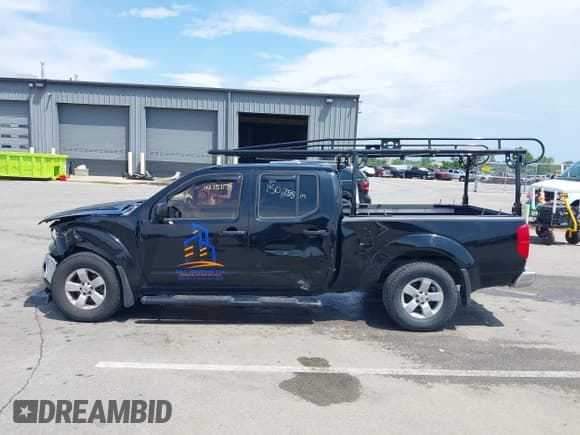 ✅ 2009 Nissan Frontier SE • VIN: 1N6AD09W69C409466 • Lot: 42757199. Listed on IAAI with 150,758 mi. Free auction sales archive from the USA and detailed vehicle history report at DreamBid. Image 15.