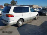 ✅ 2000 Toyota Sienna LE • VIN: 4T3ZF13C8YU301558 • Lot: 43900533. Listed on IAAI with 241,379 mi. Free auction sales archive from the USA and detailed vehicle history report at DreamBid. Image 4.