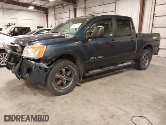 ✅ 2015 Nissan Titan SV • VIN: 1N6AA0ECXFN507338 • Lot: 43703382. Listed on IAAI with 176,222 mi. Free auction sales archive from the USA and detailed vehicle history report at DreamBid. Image 2.