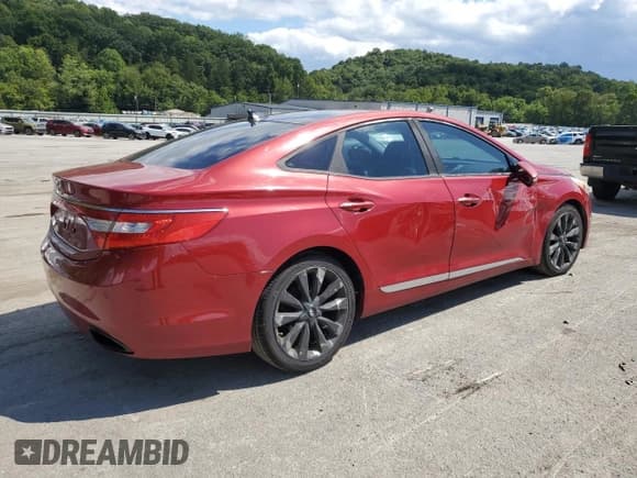 ✅ 2012 Hyundai Azera • VIN: KMHFH4JG9CA157381 • Лот: 70351685. Опубликован ранее на Copart с пробегом 165 672 миль. Бесплатный доступ к архиву аукционных продаж из США и подробный отчёт об истории автомобиля на DreamBid. Изображение 3.