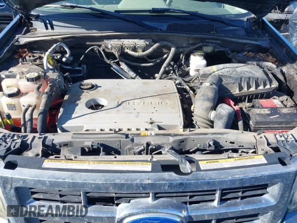 ✅ 2011 Ford Escape Hybrid • VIN: 1FMCU4K36BKC04787 • Lot: 41947008. Wystawiony na IAAI z przebiegiem 132 403 mil. Bezpłatny archiwum sprzedaży aukcyjnych z USA i szczegółowy raport historii pojazdu na DreamBid. Zdjęcie 10.