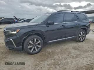 ✅ 2023 Honda Pilot Touring • VIN: 5FNYG2H7XPB003334 • Lot: 95430665. Listed on Copart with 37,652 mi. Free auction sales archive from the USA and detailed vehicle history report at DreamBid. Image 1.