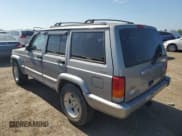 ✅ 2001 Jeep Cherokee Sport • VIN: 1J4FF58S61L540796 • Lot: 62384895. Listed on Copart with 209,294 mi. Free auction sales archive from the USA and detailed vehicle history report at DreamBid. Image 2.