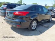 ✅ 2018 Ford Focus SE • VIN: 1FADP3FE8JL281651 • Lot: 43169650. Listed on IAAI with 69,451 mi. Free auction sales archive from the USA and detailed vehicle history report at DreamBid. Image 4.