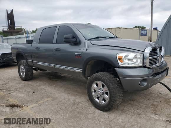 2007 Dodge 3500 Laramie z VIN 3D7MX39A47G781885, wystawiony jako Copart lot #57510764 z przebiegiem 192 720 mil mil oraz Szkoda całkowita • Salvage title. Historia ofert i sprzedaży dostępna na DreamBid. Obrazek 4.