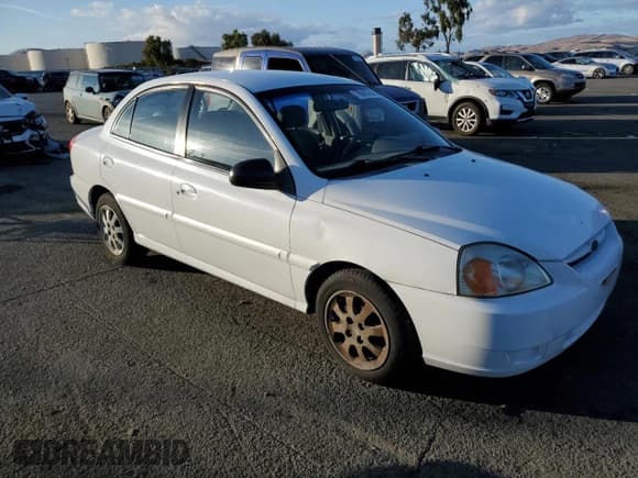 ✅ 2005 Kia Rio • VIN: KNADC125656373469 • Lot: 78943144. Listed on Copart with 88,398 mi. Free auction sales archive from the USA and detailed vehicle history report at DreamBid. Image 4.