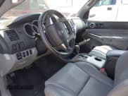 ✅ 2015 Toyota Tacoma PreRunner • VIN: 3TMKU4HN9FM045948 • Lot: 42575327. Listed on IAAI with 67,971 mi. Free auction sales archive from the USA and detailed vehicle history report at DreamBid. Image 5.