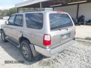 ✅ 2002 Toyota 4Runner SR5 • VIN: JT3GN86R420253009 • Lot: 43792084. Listed on IAAI with 292,981 mi. Free auction sales archive from the USA and detailed vehicle history report at DreamBid. Image 3.