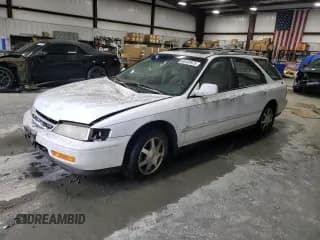 ✅ 1995 Honda Accord EX • VIN: 1HGCE1897SA010756 • Lot: 65445975. Listed on Copart with 54,064 mi. Free auction sales archive from the USA and detailed vehicle history report at DreamBid. Image 1.