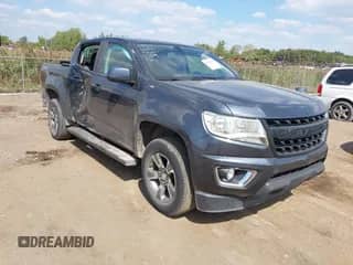 2019 Chevrolet Colorado 4WD Z71 z VIN 1GCGTDEN1K1259109, wystawiony jako IAAI lot #43210426 z przebiegiem 122 737 mil mil oraz . Historia ofert i sprzedaży dostępna na DreamBid. Obrazek 1.
