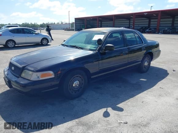 ✅ 2003 Ford Police Interceptor Street Appear • VIN: 2FAFP71W43X141540 • Lot: 43341761. Listed on IAAI with 101,636 mi. Free auction sales archive from the USA and detailed vehicle history report at DreamBid. Image 18.