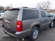 ✅ 2011 Chevrolet Suburban LTZ • VIN: 1GNSKKE33BR401419 • Lot: 38382388. Listed on IAAI with 196,842 mi. Free auction sales archive from the USA and detailed vehicle history report at DreamBid. Image 4.