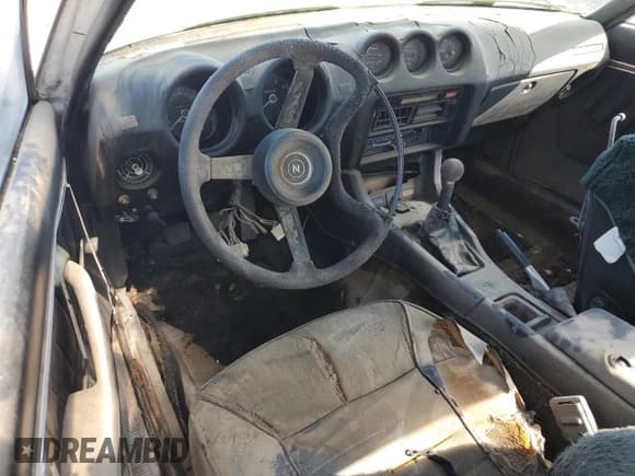 ✅ 1977 Datsun 280ZX • VIN: HLS30385465 • Lot: 63700715. Listed on Copart with 43,753 mi. Free auction sales archive from the USA and detailed vehicle history report at DreamBid. Image 8.