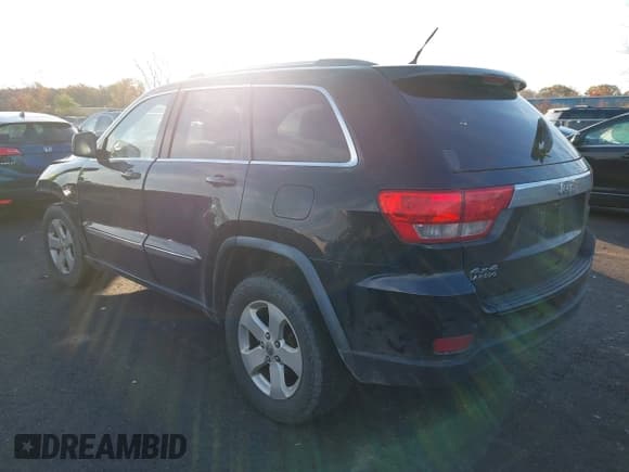 ✅ 2012 Jeep Grand Cherokee Laredo • VIN: 1C4RJFAG3CC221565 • Lot: 43618945. Listed on IAAI with 160,737 mi. Free auction sales archive from the USA and detailed vehicle history report at DreamBid. Image 3.