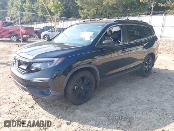 ✅ 2021 Honda Pilot Special Edition • VIN: 5FNYF5H22MB006278 • Lot: 43229349. Listed on IAAI with 111,289 mi. Free auction sales archive from the USA and detailed vehicle history report at DreamBid. Image 19.