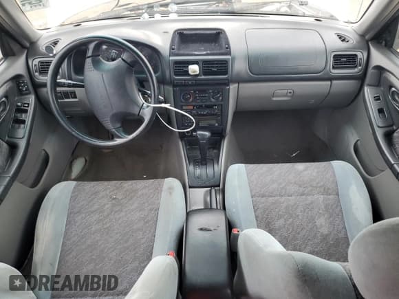 ✅ 2000 Subaru Forester L • VIN: JF1SF6351YH724848 • Lot: 82356945. Wystawiony na Copart z przebiegiem 130 868 mil. Bezpłatny archiwum sprzedaży aukcyjnych z USA i szczegółowy raport historii pojazdu na DreamBid. Zdjęcie 8.