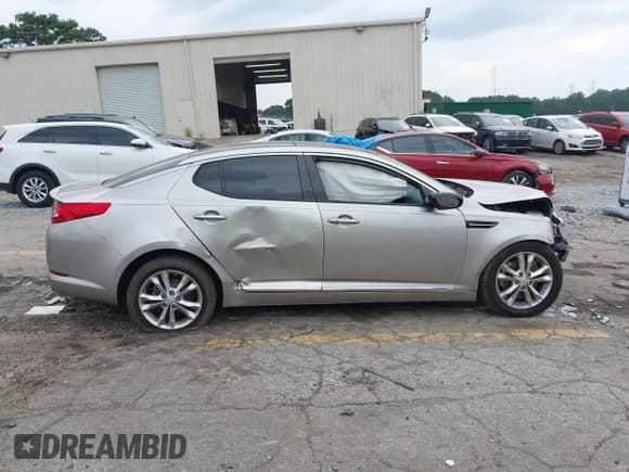 ✅ 2012 Kia Optima EX • VIN: 5XXGN4A62CG074341 • Lot: 43106753. Listed on IAAI with 129,666 mi. Free auction sales archive from the USA and detailed vehicle history report at DreamBid. Image 13.