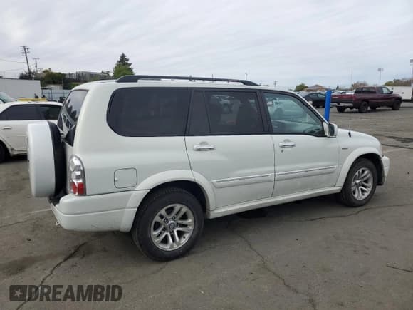 ✅ 2004 Suzuki XL7 LX • VIN: JS3TY92V844108854 • Лот: 49650735. Опубликован ранее на Copart с пробегом 201 373 миль. Бесплатный доступ к архиву аукционных продаж из США и подробный отчёт об истории автомобиля на DreamBid. Изображение 3.