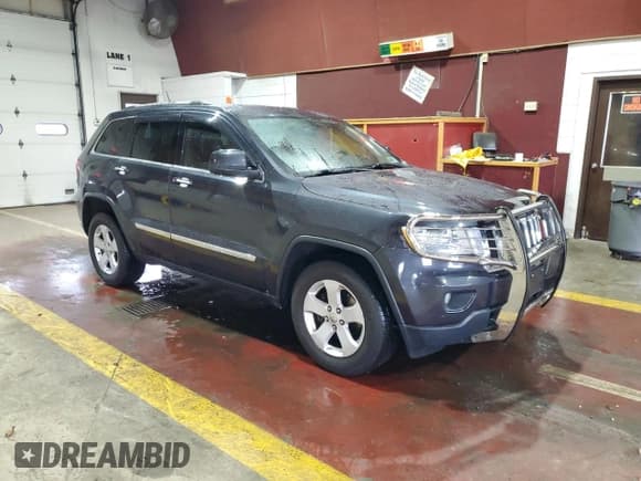 ✅ 2012 Jeep Grand Cherokee Laredo • VIN: 1C4RJFAG8CC225787 • Lot: 86138655. Listed on Copart with 71,324 mi. Free auction sales archive from the USA and detailed vehicle history report at DreamBid. Image 4.