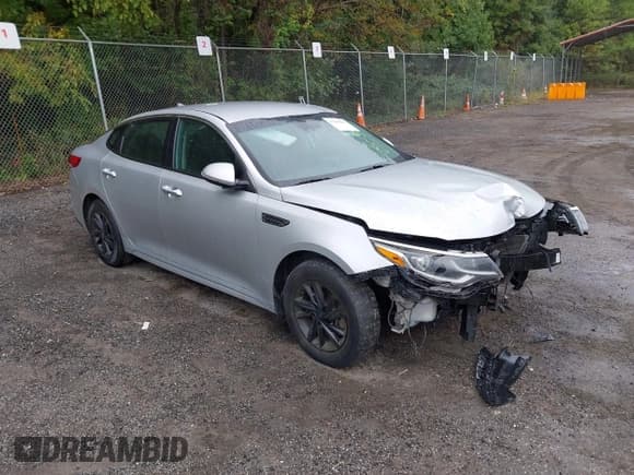 ✅ 2019 Kia Optima LX • VIN: 5XXGT4L35KG281751 • Lot: 43440219. Listed on IAAI with 128,414 mi. Free auction sales archive from the USA and detailed vehicle history report at DreamBid. Image 1.