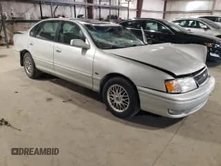 ✅ 1999 Toyota Avalon XL • VIN: 4T1BF18B7XU344975 • Лот: 67690434. Опубликован ранее на Copart с пробегом 145 546 миль. Бесплатный доступ к архиву аукционных продаж из США и подробный отчёт об истории автомобиля на DreamBid. Изображение 4.