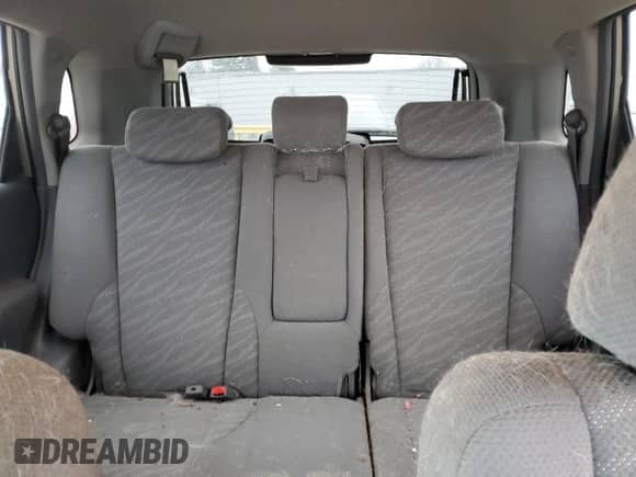 2005 Hyundai Tucson GL z VIN KM8JM12B75U146582, wystawiony jako Copart lot #82966094 z przebiegiem 132 445 mil mil oraz Nie do naprawy • Non repairable. Historia ofert i sprzedaży dostępna na DreamBid. Obrazek 10.